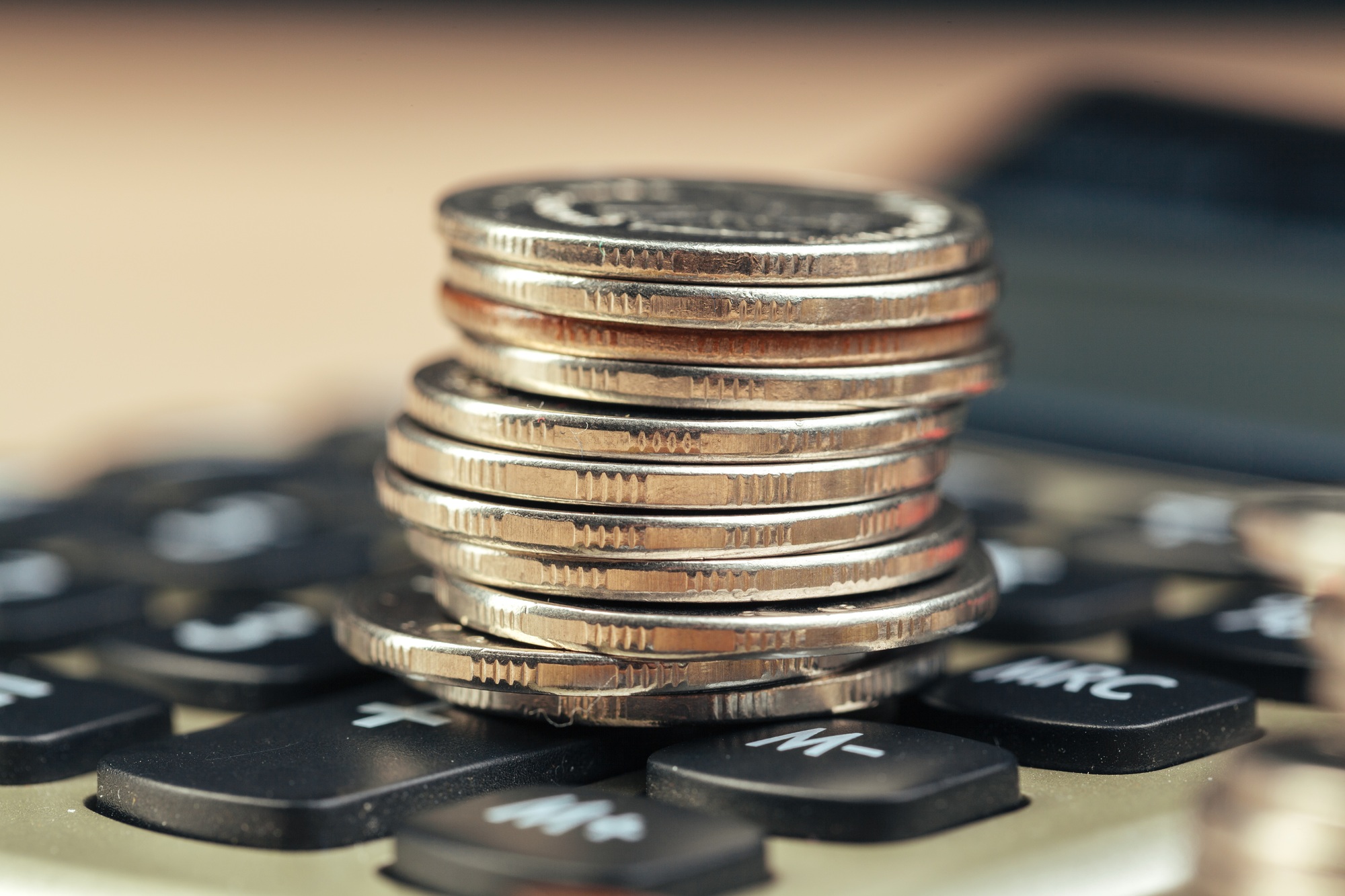stack of coins and calculator,concept idea for business finance
